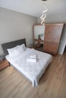 Postel nebo postele na pokoji v ubytování King Suite TH28