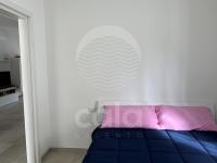 A bed or beds in a room at Villa Alysa - spiaggia a 400m By Cala Salento