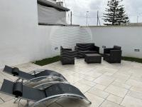 A seating area at Villa Alysa - spiaggia a 400m By Cala Salento