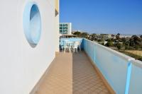 A balcony or terrace at Seafront view studio in Bibione - Beahost