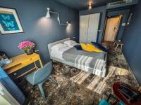 A bed or beds in a room at Hotel Rila