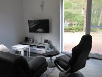 Ferienhaus Am Waldrand - "Libelle"にあるテレビまたはエンターテインメントセンター