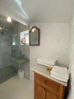 a bathroom with a sink and a counter with towels at Campagne Salettes in Lorgues
