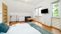 Posteľ alebo postele v izbe v ubytovaní Apartamenty EverySky - Dom Reymonta 9