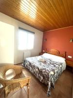 A bed or beds in a room at Complejo la Regalina