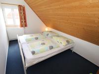 Postel nebo postele na pokoji v ubytování Ferienhaus Cerny Dul 200S