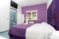 Guest House Emily Suites Sorrentoにあるベッド