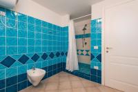 A bathroom at Apartment in S'Abba e Sa Pedra with pool