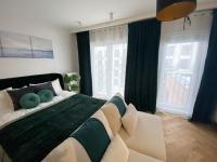 Posteľ alebo postele v izbe v ubytovaní Wileńska home apartment 3