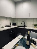 Kuchyňa alebo kuchynka v ubytovaní Wileńska home apartment 3