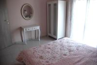 A bed or beds in a room at Vintage Home