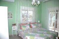 A bed or beds in a room at Vintage Home