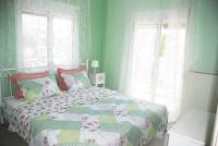 A bed or beds in a room at Vintage Home