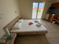 Posteľ alebo postele v izbe v ubytovaní Villa Meresi - Thassos Town Center