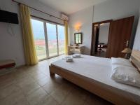 Posteľ alebo postele v izbe v ubytovaní Villa Meresi - Thassos Town Center