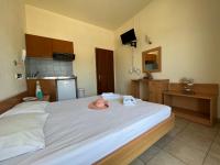 Posteľ alebo postele v izbe v ubytovaní Villa Meresi - Thassos Town Center