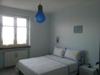 Posteľ alebo postele v izbe v ubytovaní Conte Caramelli Apartment
