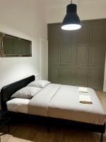 Una cama o camas en una habitaci&oacute;n de R&eacute;publique :Appartement T3 Centre historique