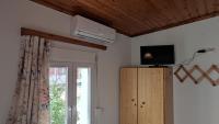 TV a/nebo společenská místnost v ubytování Angelos Rooms