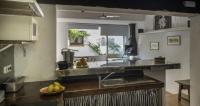 A kitchen or kitchenette at Flateli Sa Tuna Apartment