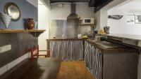 A kitchen or kitchenette at Flateli Sa Tuna Apartment