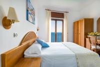 Posteľ alebo postele v izbe v ubytovaní Hotel Sporting