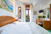 Posteľ alebo postele v izbe v ubytovaní Hotel Sporting