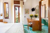 Posteľ alebo postele v izbe v ubytovaní Hotel Sporting