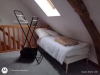 Łóżko lub łóżka w pokoju w obiekcie Maison au pays des milles étangs