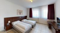Postel nebo postele na pokoji v ubytování Hotel San Marco