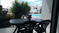 Bazén v ubytování Los Arcos 304, Puerto del Carmen Lanzarote nebo v jeho okolí