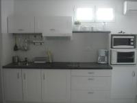 Kuchnia lub aneks kuchenny w obiekcie Beau T2 climatisé avec garage, 4 couchages, Balaruc-les-Bains - FR-1-680-13