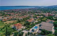 an aerial view of a small town next to a body of water at Amazing Home In Kastel Stari With Kitchen in Kastel Novi