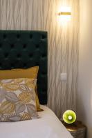 Postel nebo postele na pokoji v ubytování Cinema Luxury House