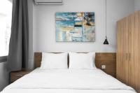 Posteľ alebo postele v izbe v ubytovaní Ipanema, Nilie Hospitality MGMT
