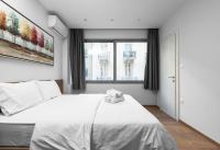 Posteľ alebo postele v izbe v ubytovaní Ipanema, Nilie Hospitality MGMT