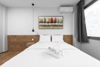 Posteľ alebo postele v izbe v ubytovaní Ipanema, Nilie Hospitality MGMT