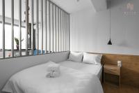 Posteľ alebo postele v izbe v ubytovaní Ipanema, Nilie Hospitality MGMT