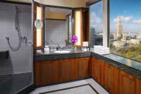 a bathroom with a sink and a view of the city at Warsaw Presidential Hotel in Warsaw