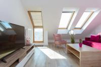 Televízia a/alebo spoločenská miestnosť v ubytovaní DreamHouse Apartament „Laguna” ul. Wschodnia 12, Darłówko Wschodnie