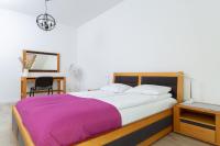 Posteľ alebo postele v izbe v ubytovaní DreamHouse Apartament „Laguna” ul. Wschodnia 12, Darłówko Wschodnie