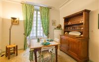 a room with a table and a large window at Cozy Apartment In Saint Jean Du Bruel With Private Swimming Pool, Can Be Inside Or Outside in Saint-Jean-du-Bruel