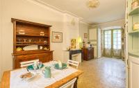 a dining room with a table and chairs at Cozy Apartment In Saint Jean Du Bruel With Private Swimming Pool, Can Be Inside Or Outside in Saint-Jean-du-Bruel