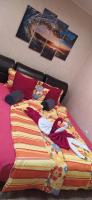 A bed or beds in a room at Velvita Sliven