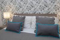 Posteľ alebo postele v izbe v ubytovaní Nobilcasa Suites
