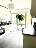 A cozinha ou cozinha compacta de Votre appartement pr&egrave;s du centre de Bordeaux