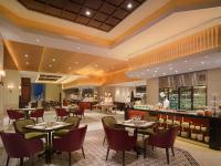Un restaurante u otro lugar para comer en Shangri-La Manzhouli