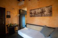 Posteľ alebo postele v izbe v ubytovaní Cambiocavallo Resort