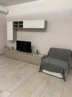 Televízia a/alebo spoločenská miestnosť v ubytovaní Rosy Bed&Breakfast