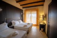Posteľ alebo postele v izbe v ubytovaní Cambiocavallo Resort